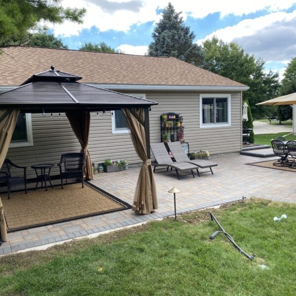 Fendt brick paver gazebo draped seating patio