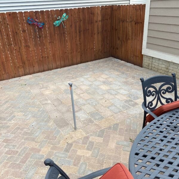 Fendt brick paver herringbone backyard dining setup