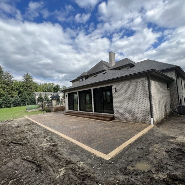 Fendt brick paver red bordered elevated house patio
